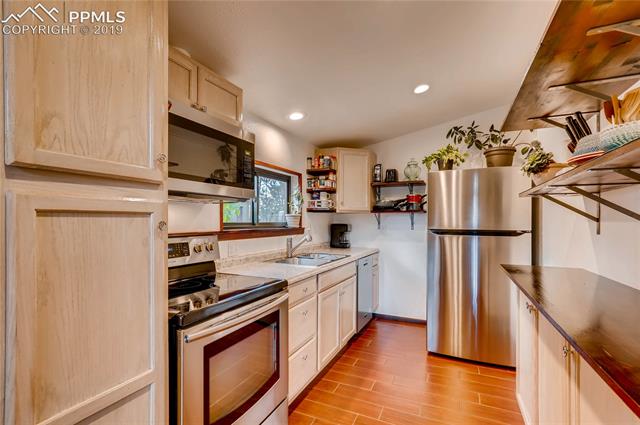 91 Alpine Road Woodland Park, CO 80863 - Photo 13 of 36 Newer stainless steel appliances.