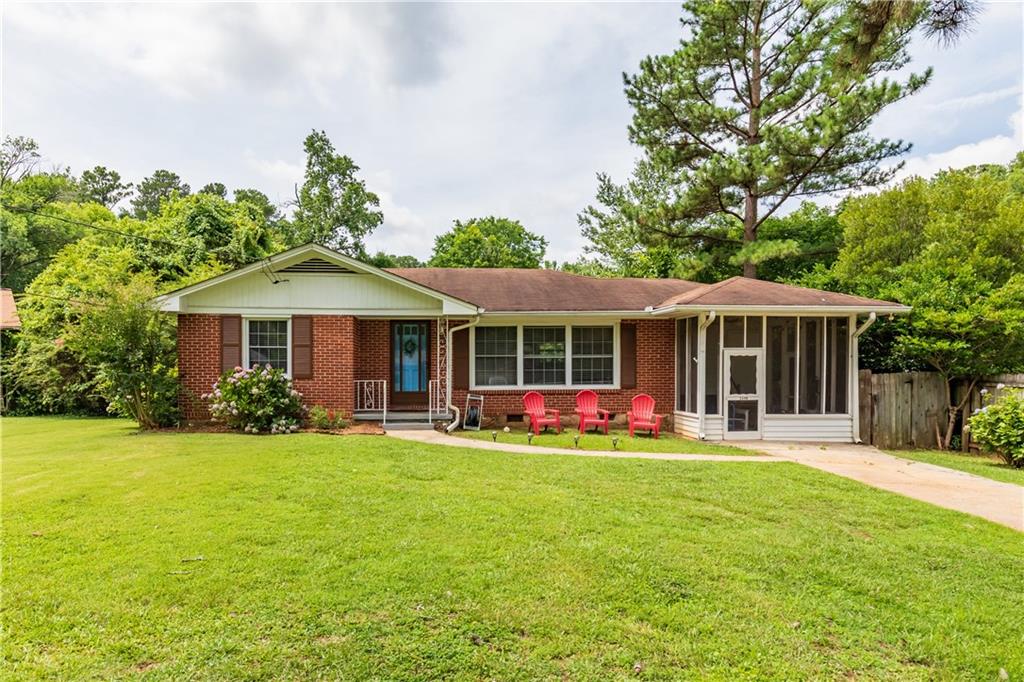 2498 Joiner Court Decatur, GA 30033 - Photo 1 of 1 a front view of a house with a yard and trees