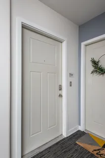 a view of room with wooden floor