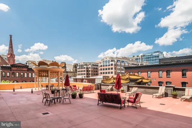 a view of a terrace with seating area