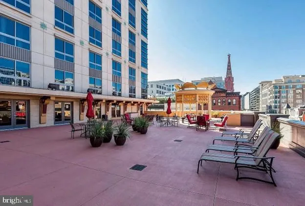 a view of a terrace with sitting area