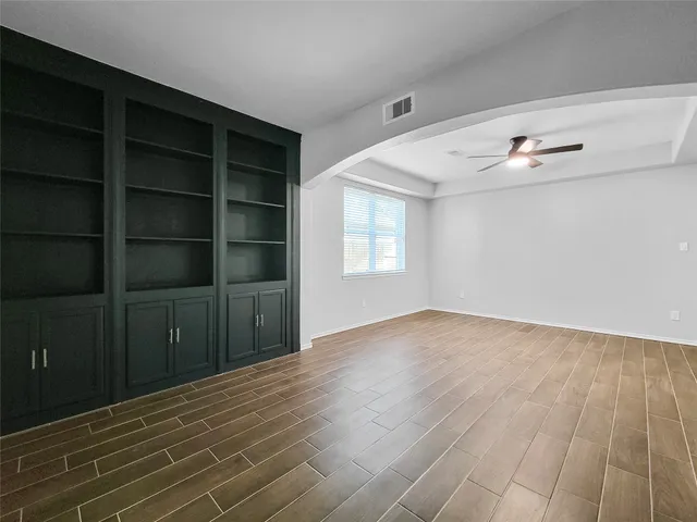 an empty room with windows