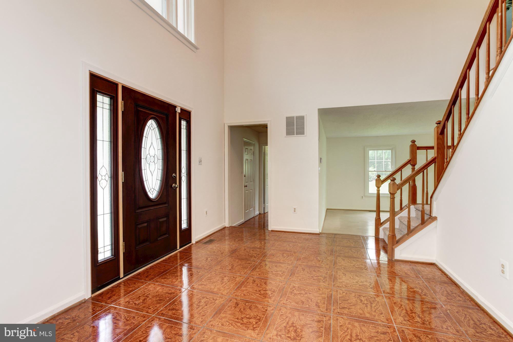 1813 Middlebridge Drive Silver Spring, MD 20906 - Photo 2 of 16 Double-height entry