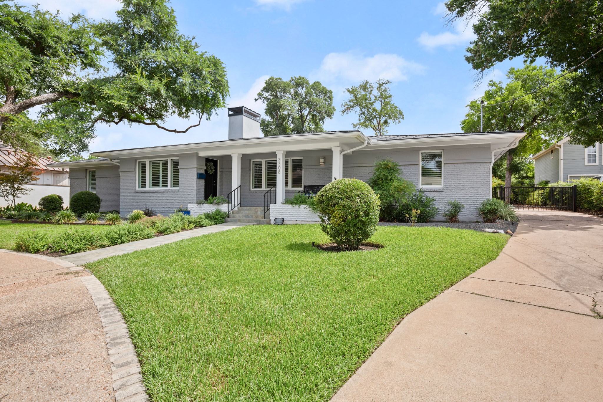 3308 Windsor Road Austin, TX 78703 - Photo 1 of 1 Situated on a spacious .298-acre lot, this property showcases beautiful curb appeal.