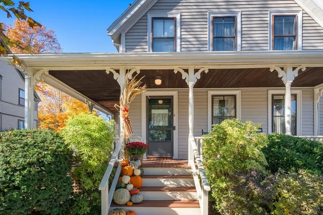 a front view of a house with a porch