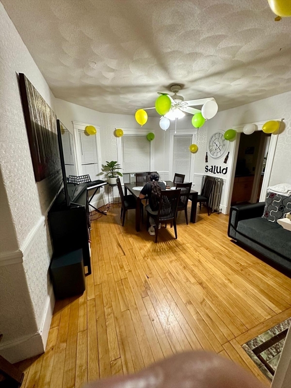 25 Seafoam Avenue, Unit 1 Winthrop, MA 02152 - Photo 14 of 17 a living room with furniture and flat screen tv