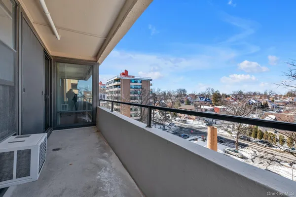 a view of a balcony with an outdoor space
