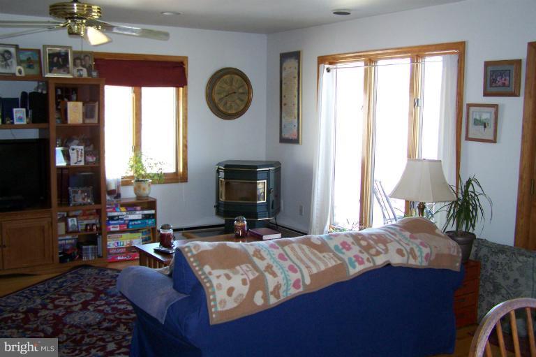 2005 Shore Drive Edgewater, MD 21037 - Photo 13 of 29 a bed sitting in a bedroom next to a window