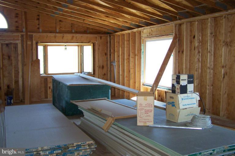 2005 Shore Drive Edgewater, MD 21037 - Photo 17 of 29 a bedroom with furniture and a window