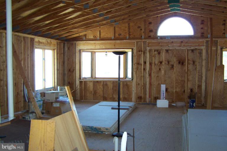 2005 Shore Drive Edgewater, MD 21037 - Photo 22 of 29 a living room with a bed and furniture