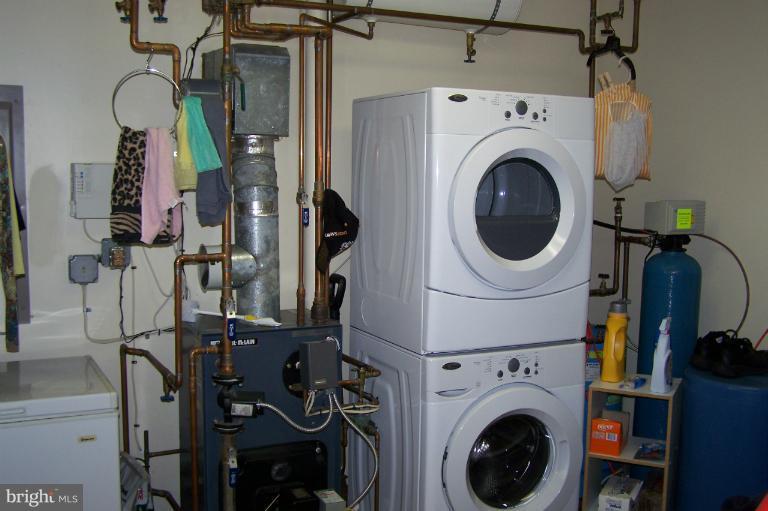 2005 Shore Drive Edgewater, MD 21037 - Photo 24 of 29 a utility room with dryer washer and a view of living room