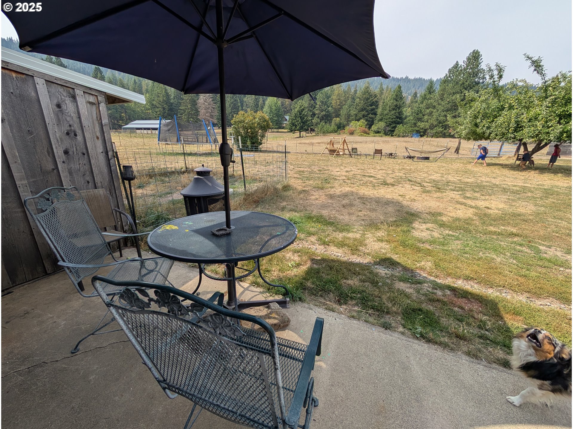 71168 Valley View Road Elgin, OR 97827 - Photo 20 of 32 a view of a backyard with sitting area