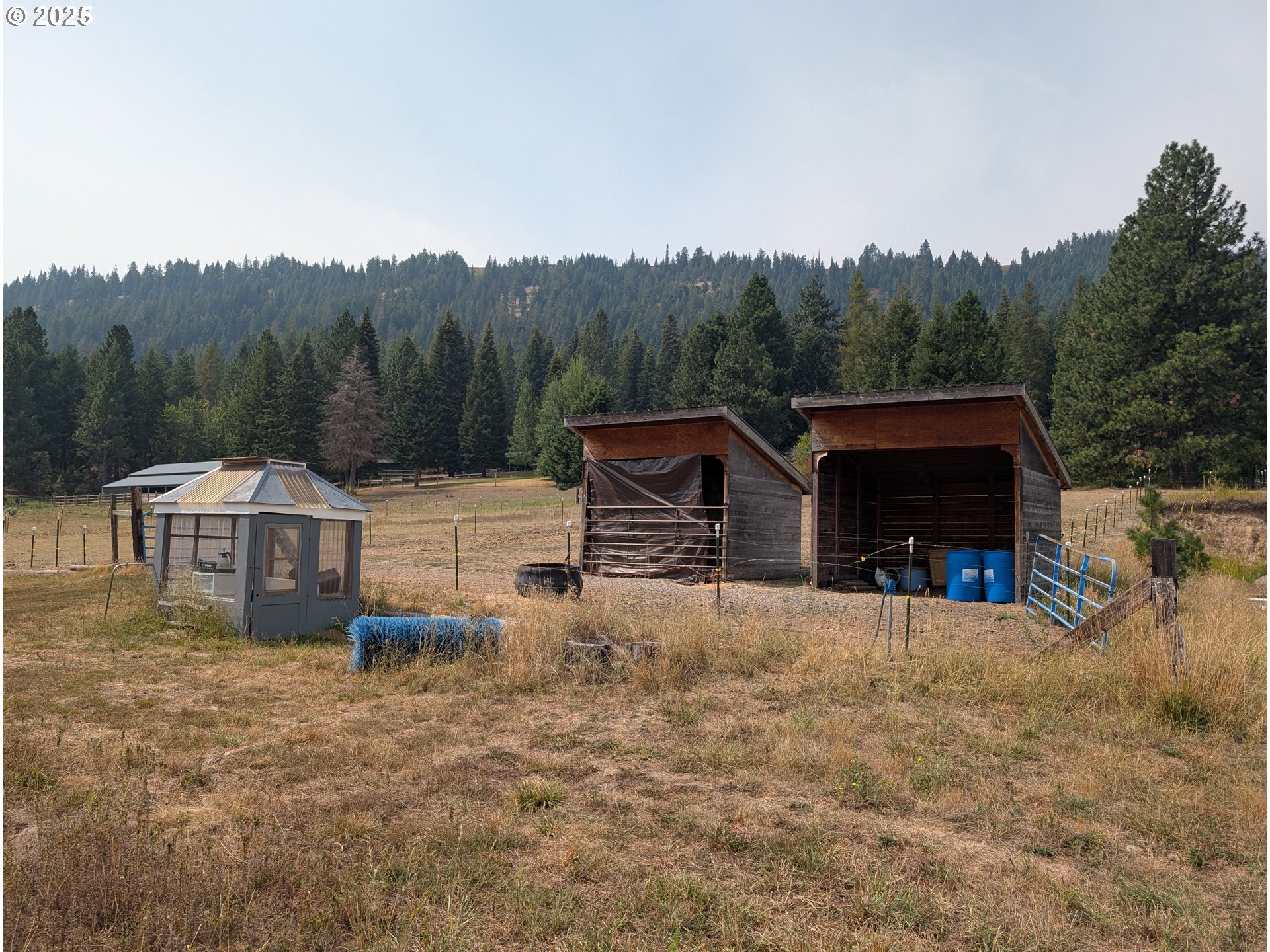 71168 Valley View Road Elgin, OR 97827 - Photo 26 of 32 a view of a house with wooden floor and a yard