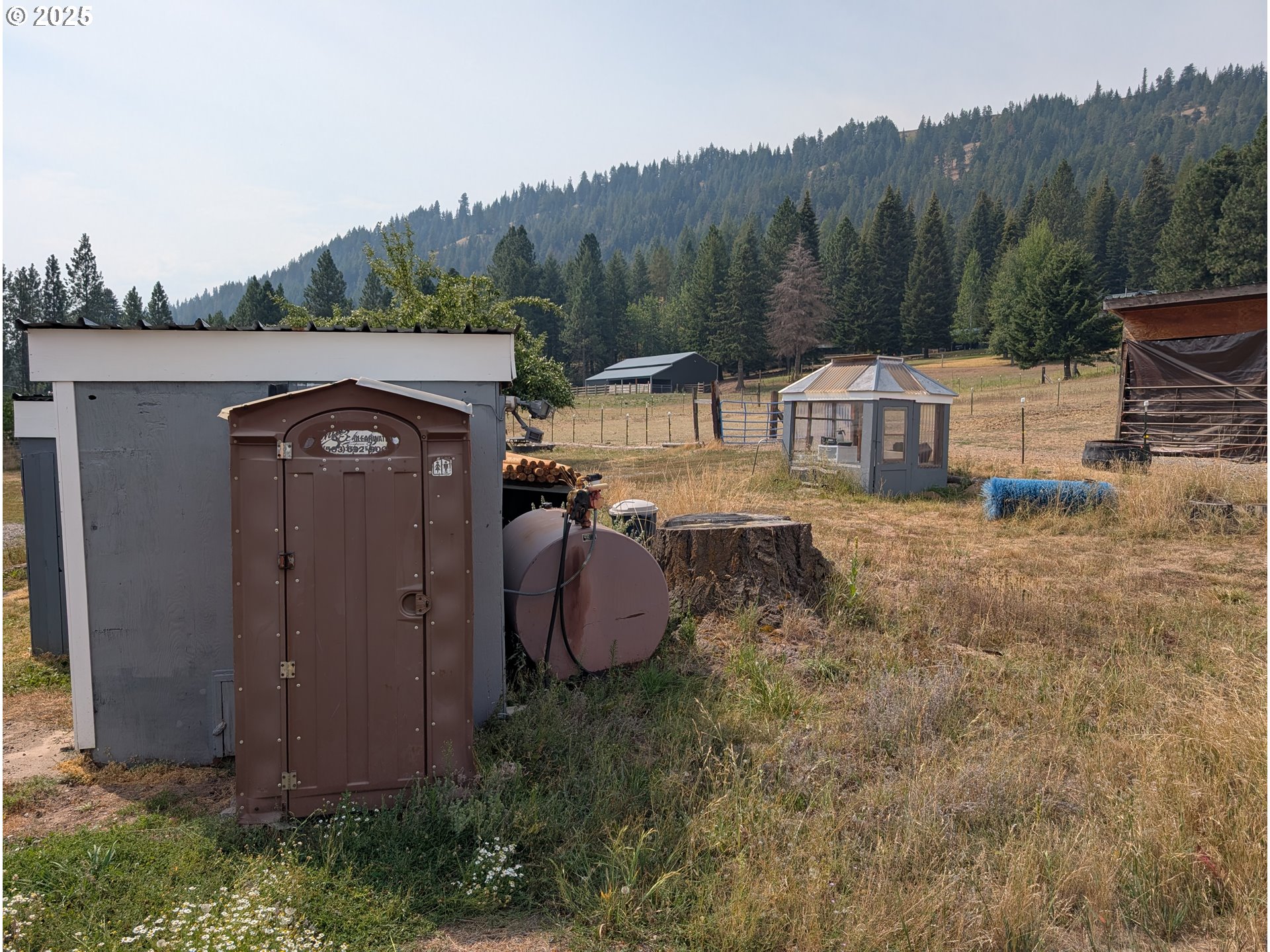 71168 Valley View Road Elgin, OR 97827 - Photo 32 of 32 a view of a house with a yard and furniture