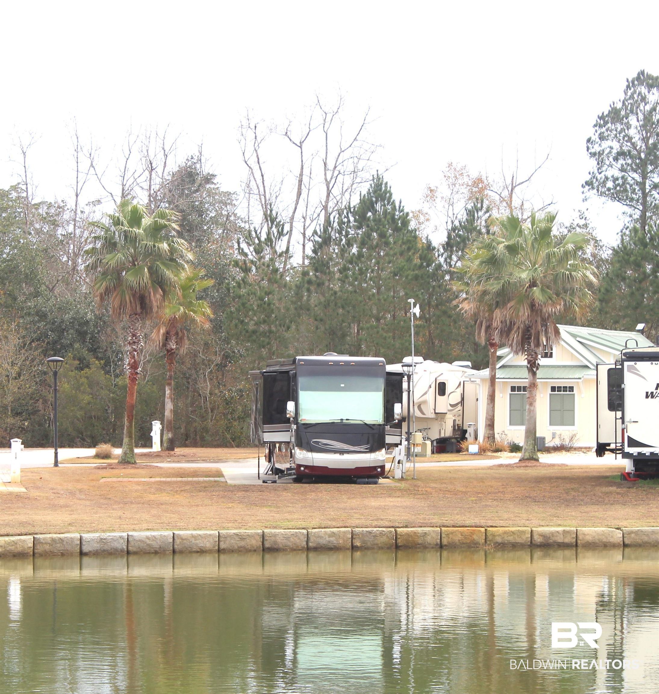 11876 Gateway Drive Elberta, AL 36530 - Photo 5 of 43 Exterior space featuring a boat dock