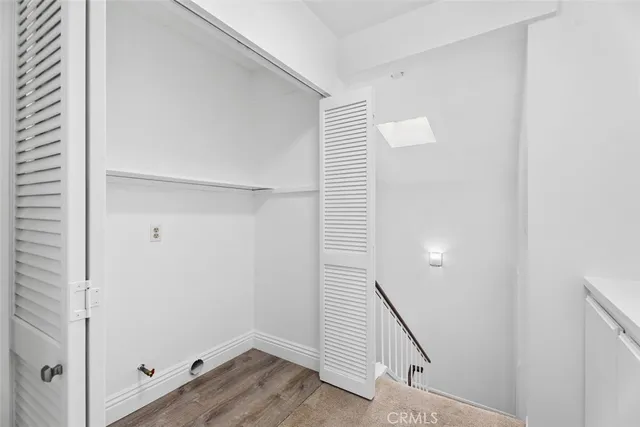 a view of a hallway with staircase