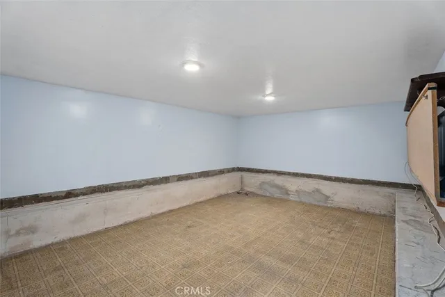 a view of a room with an empty space