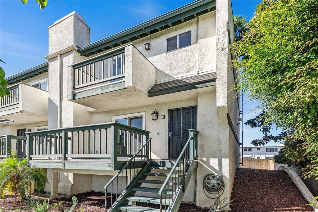 428 West First Street Tustin, CA 92780 - Photo 29 of 35 a view of a house with backyard and deck