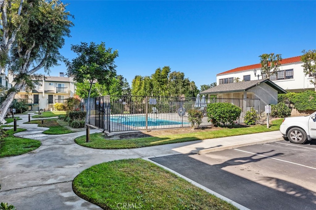 428 West First Street Tustin, CA 92780 - Photo 31 of 35 a front view of a house with a yard