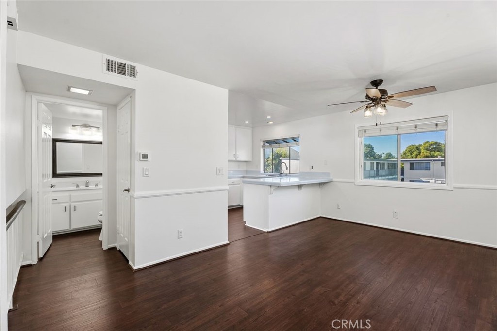 428 West First Street Tustin, CA 92780 - Photo 9 of 35 wooden floor in an empty room with a window
