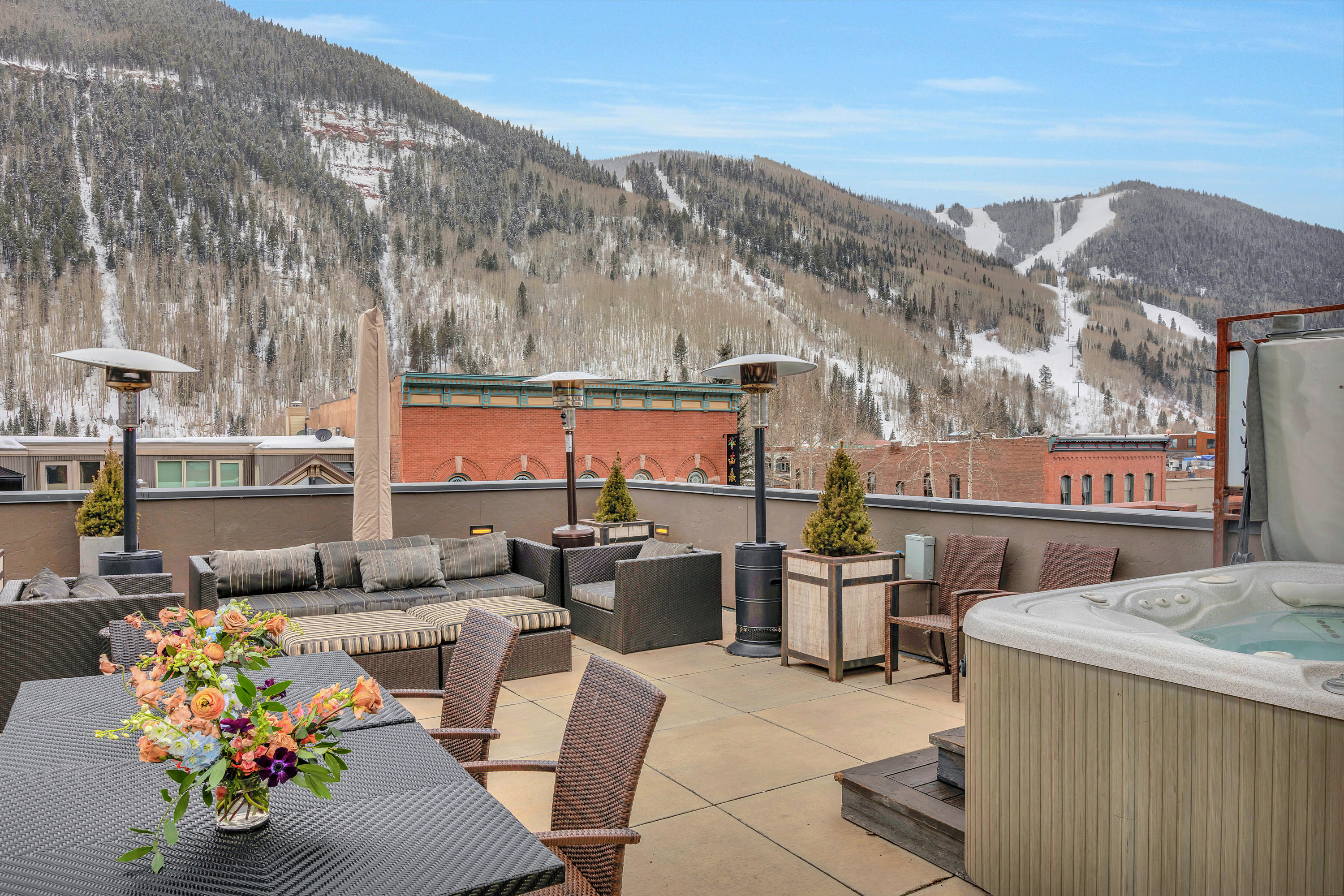 209 East Colorado Avenue, Unit R1 EH1 C1 C2 Telluride, CO 81435 - Photo 4 of 14 a view of a chairs and table in patio