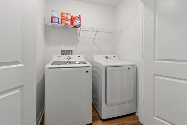 a utility room with dryer and washer