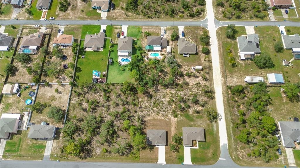 11380 Old Squaw Avenue Weeki Wachee, FL 34614 - Photo 20 of 23 a bird view of building and yard