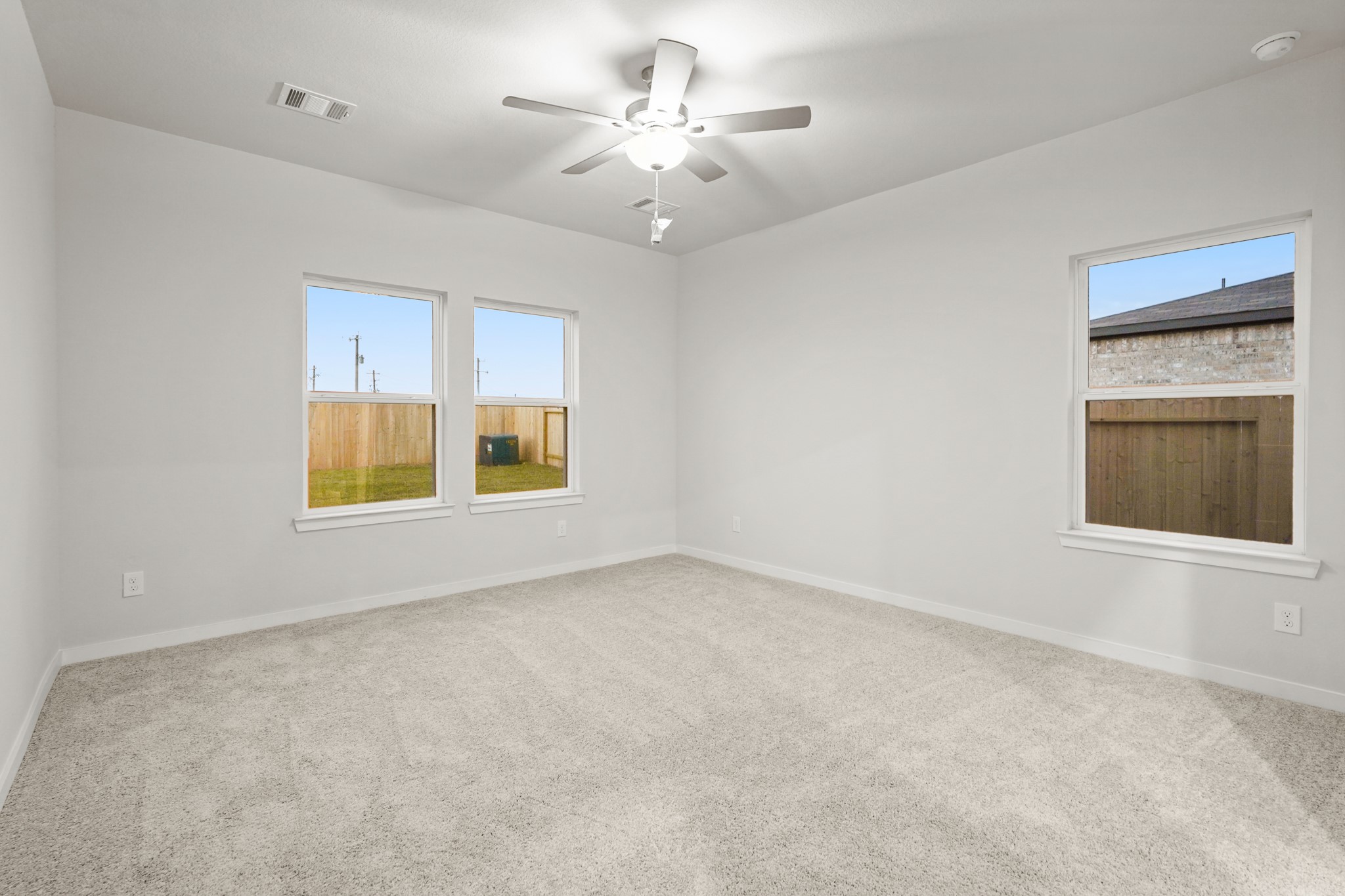 141 Byu Bnd Boulevard Angleton, TX 77515 - Photo 10 of 26 a view of an empty room with a window