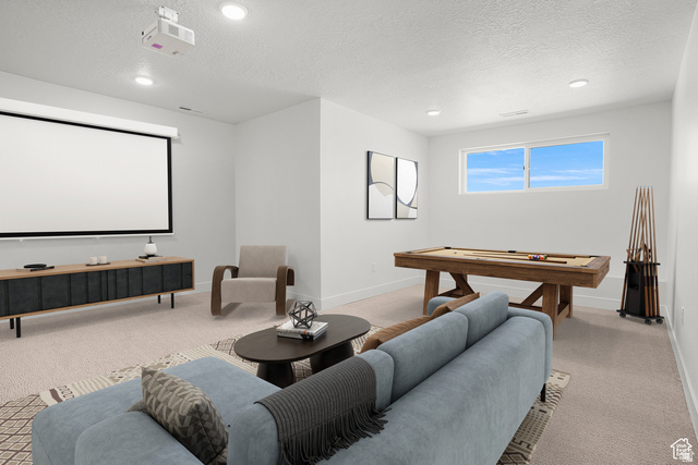 1631 West Century Lane, Unit C Mapleton, UT 84664 - Photo 4 of 31 Versatile entertainment area featuring a ceiling-mounted projector, large retractable screen, and recessed lighting