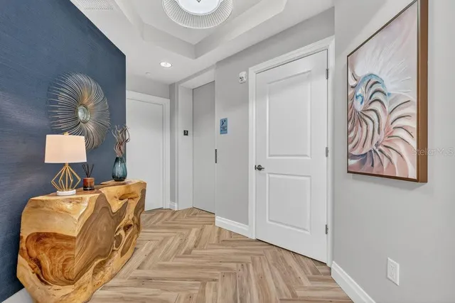 a bedroom with a bed and a mirror