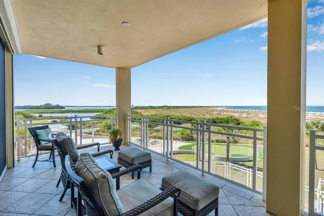 a view of a balcony with an ocean