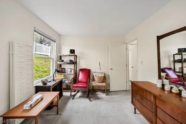 a room with furniture and a window