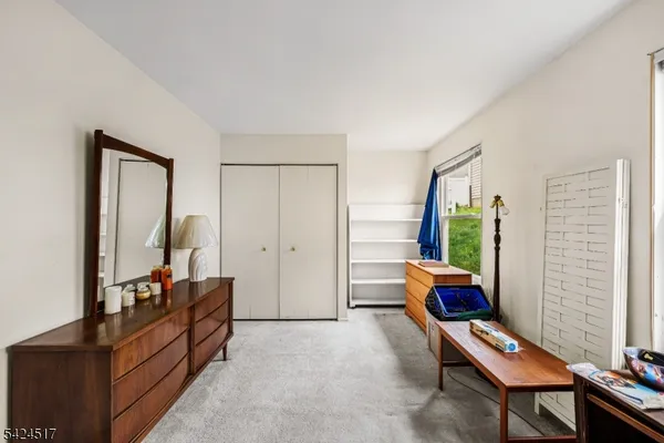 a room with furniture and a window