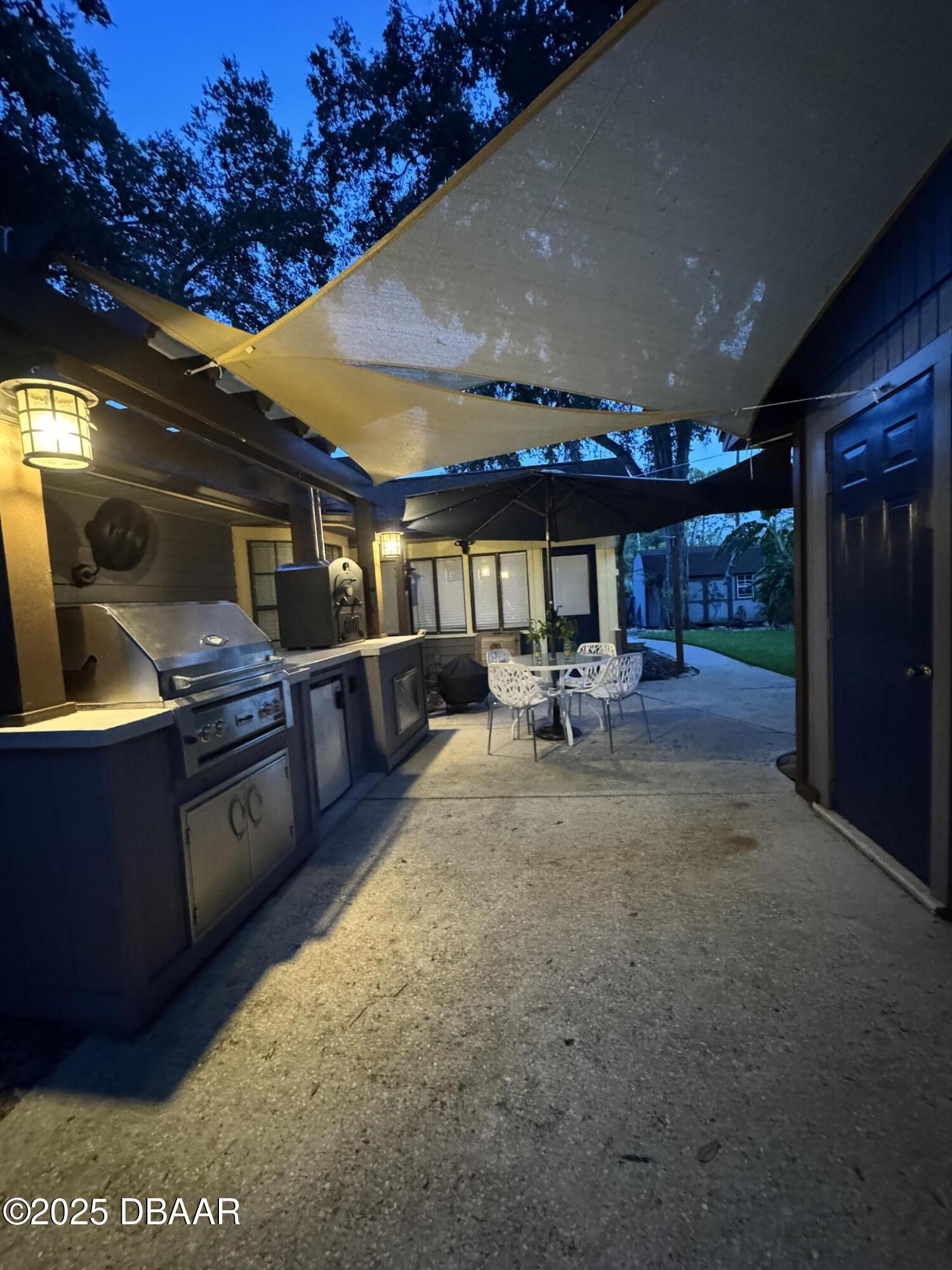 2824 Umbrella Tree Drive Edgewater, FL 32141 - Photo 29 of 36 a lobby with furniture and garden
