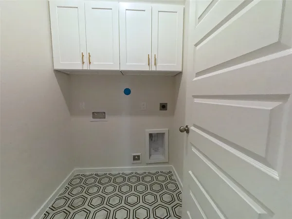 a bedroom with a bed dresser and a window