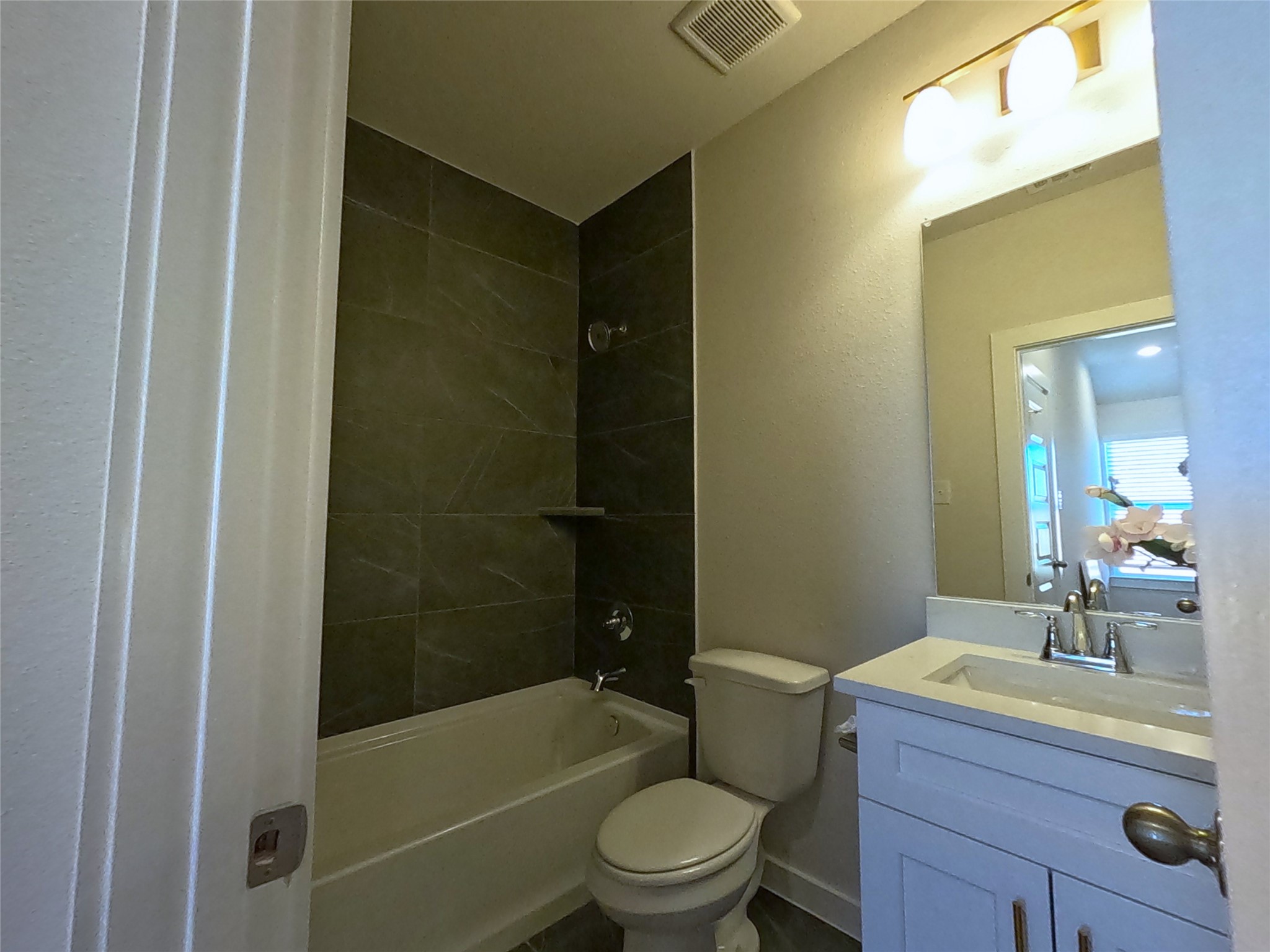 8323 Amber Summit Lane Angleton, TX 77515 - Photo 15 of 24 a bathroom with a sink a toilet and shower