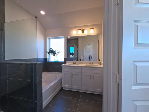 a view of staircase with white walls