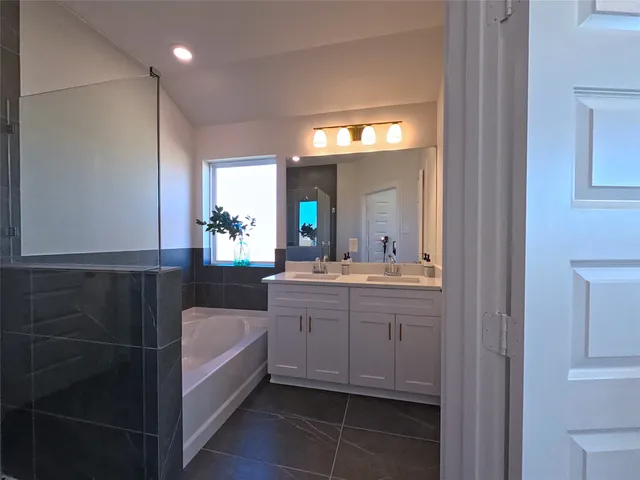 a view of staircase with white walls