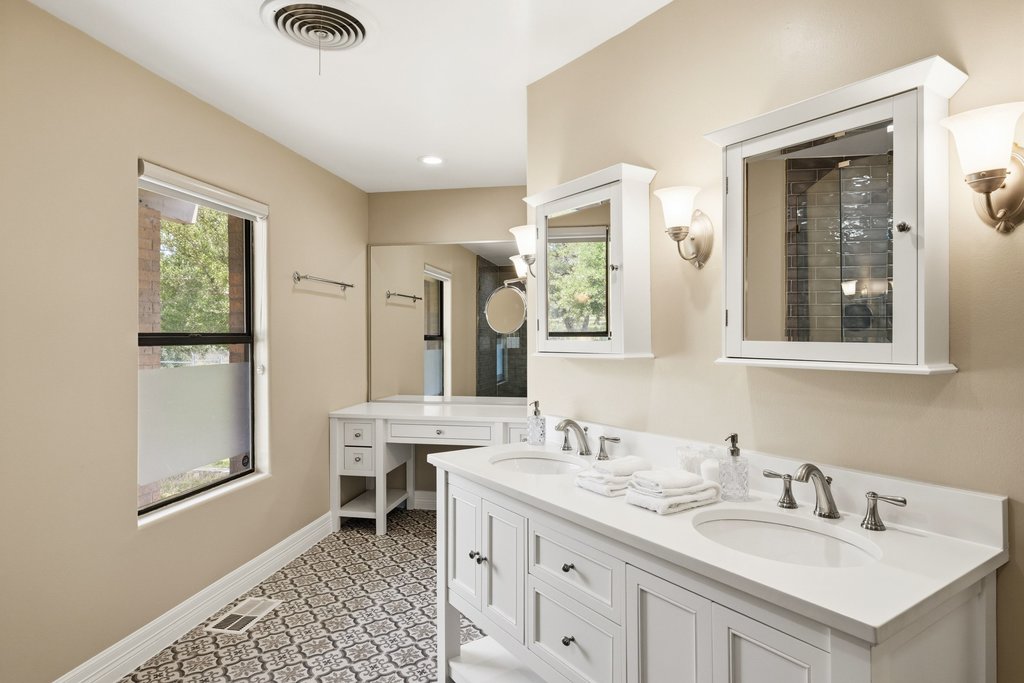 12135 Fitzhugh Road Austin, TX 78736 - Photo 9 of 30 a bathroom with a double vanity sink mirror and