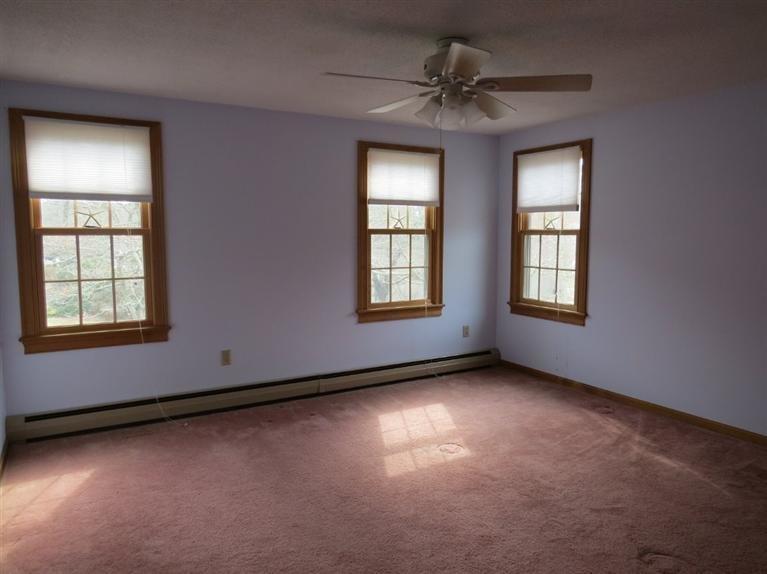 181 Cap'n Lijah's Road Centerville, MA 02632 - Photo 15 of 25 an empty room with windows