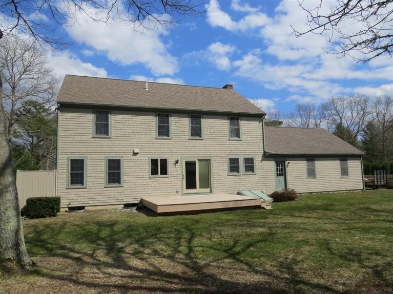 181 Cap'n Lijah's Road Centerville, MA 02632 - Photo 21 of 25 a view of a white house with a yard
