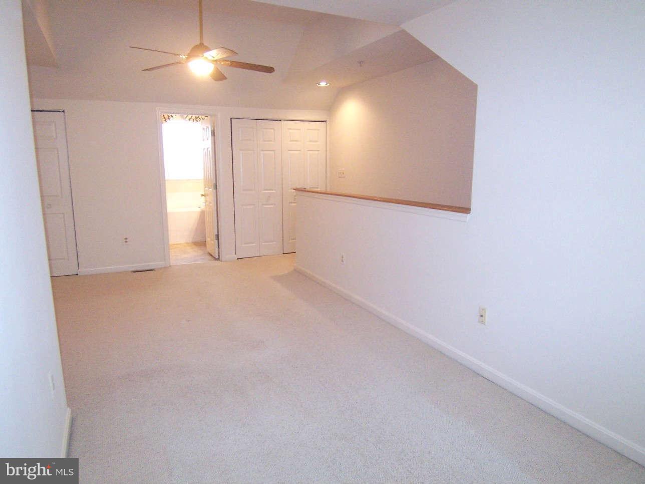 29 Bank Spring Court Owings Mills, MD 21117 - Photo 9 of 16 a view of an empty room with a window