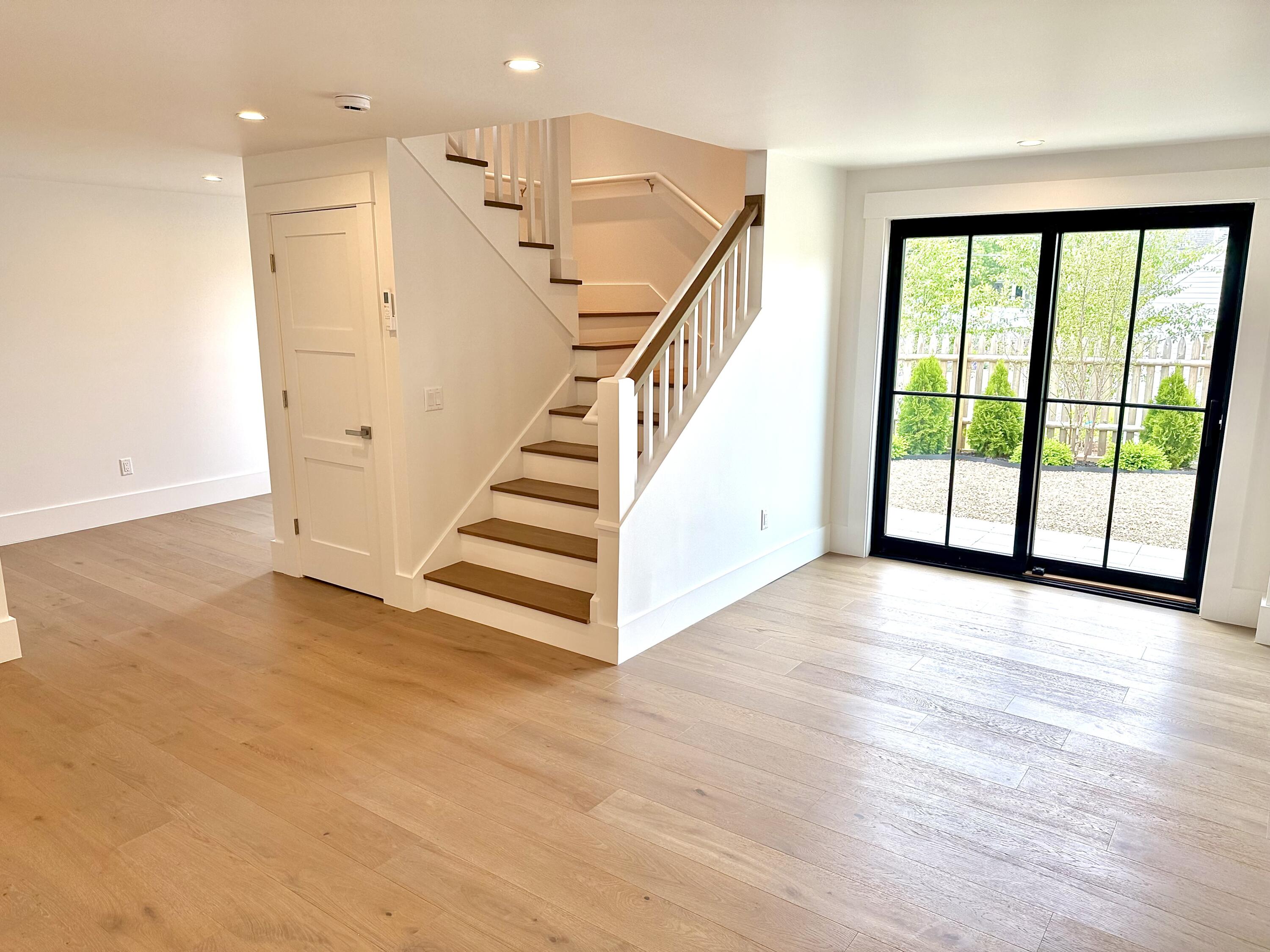 29 Cemetery Road, Unit 1 Provincetown, MA 02657 - Photo 10 of 28 lower level living area