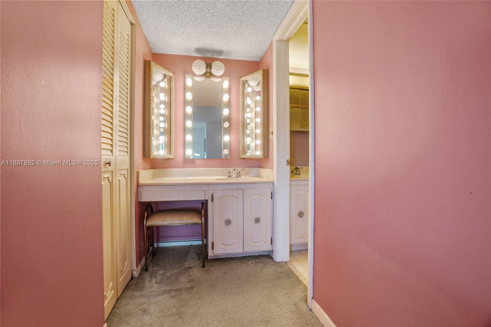 3940 Inverrary Boulevard, Unit 304A Lauderhill, FL 33319 - Photo 13 of 28 a view of an empty room with a fireplace and a window