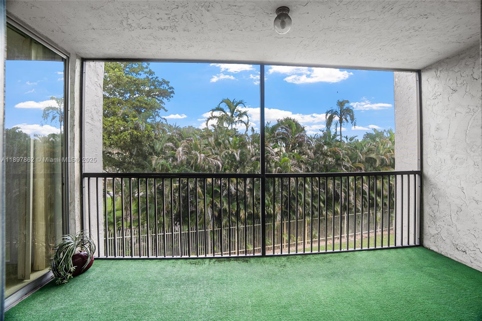 3940 Inverrary Boulevard, Unit 304A Lauderhill, FL 33319 - Photo 20 of 28 a view of a back yard from a balcony