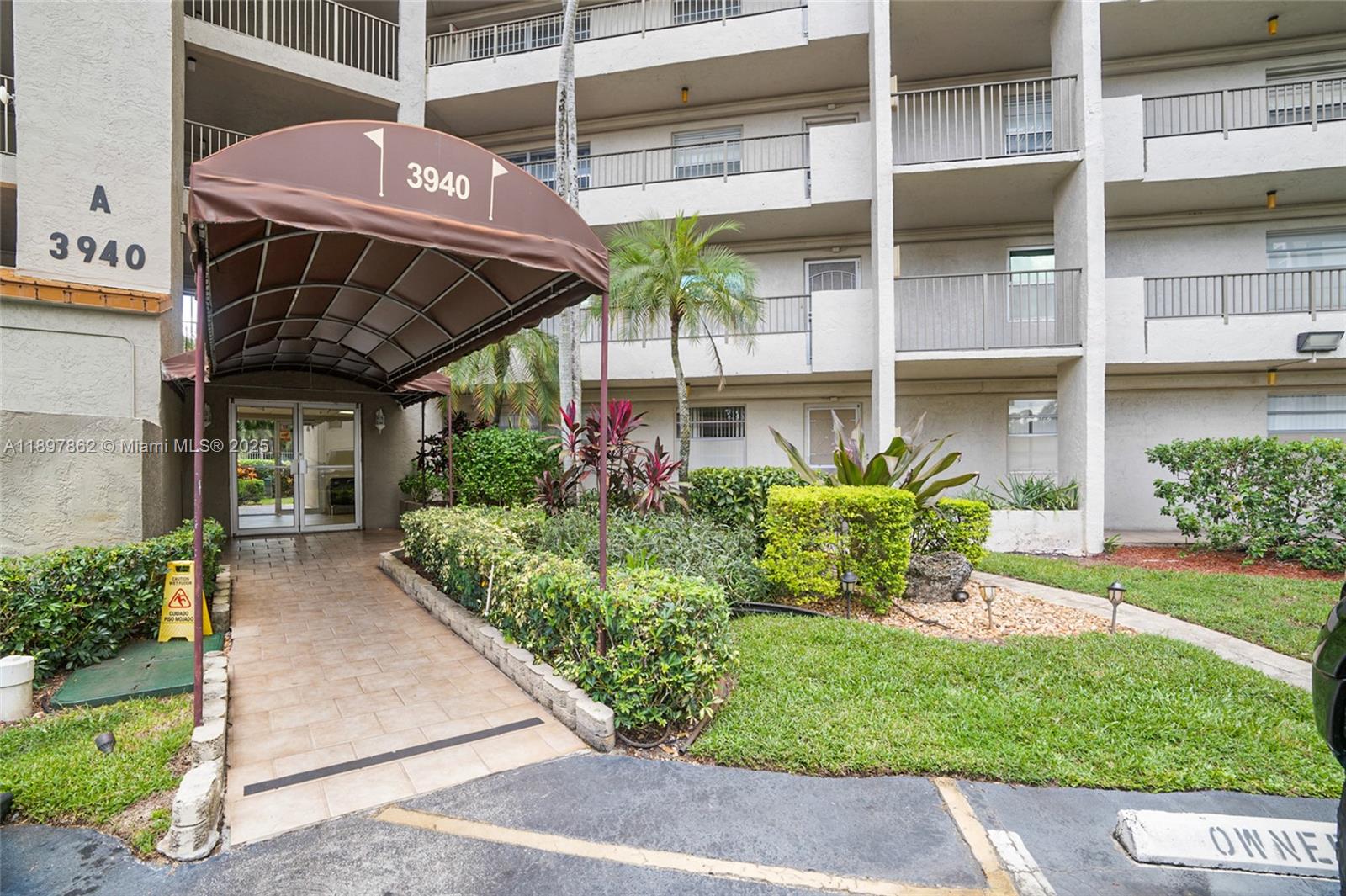 3940 Inverrary Boulevard, Unit 304A Lauderhill, FL 33319 - Photo 23 of 28 a view of a porch with a bench in patio