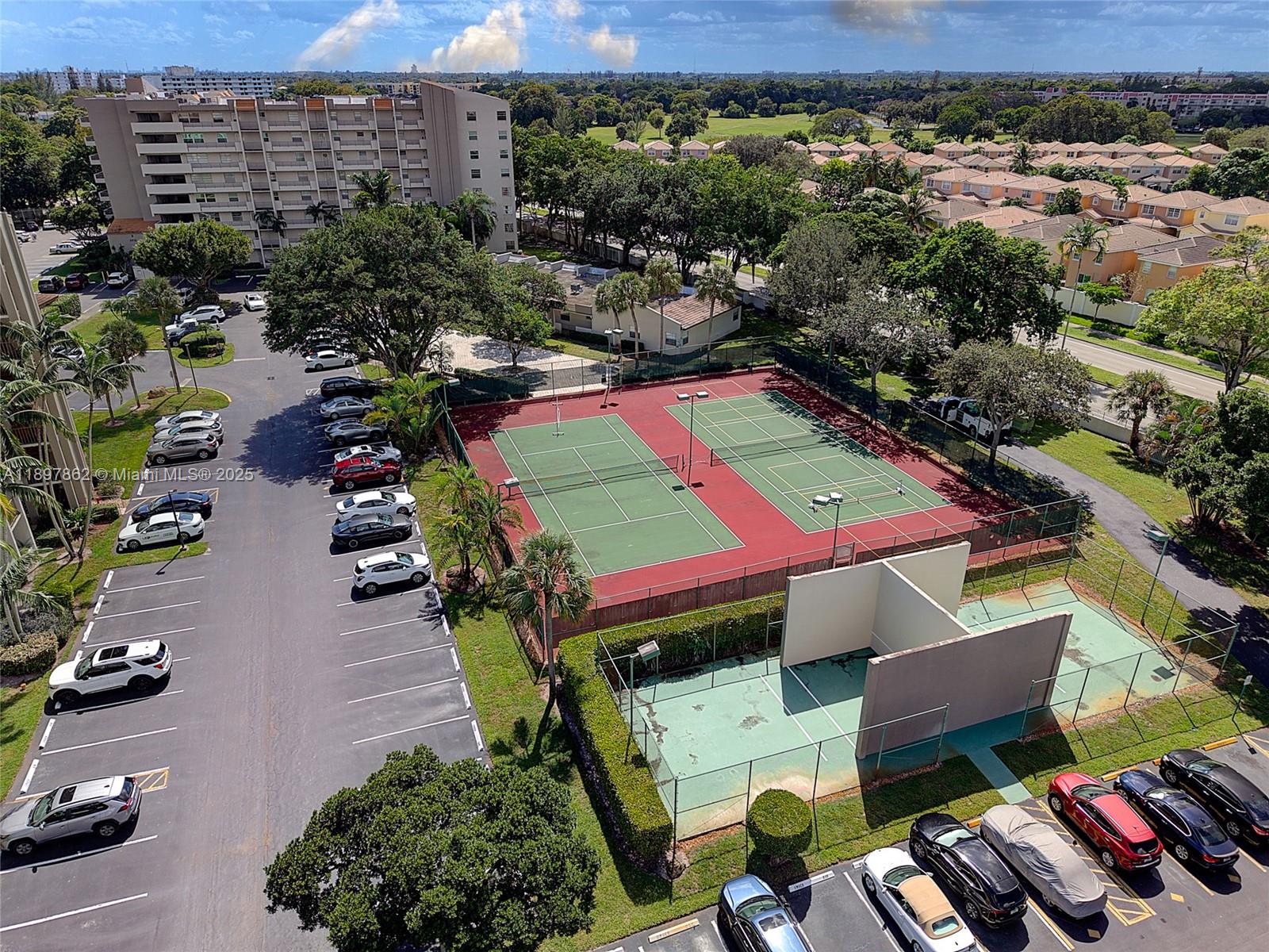 3940 Inverrary Boulevard, Unit 304A Lauderhill, FL 33319 - Photo 28 of 28 an aerial view of a pool patio yard and outdoor seating