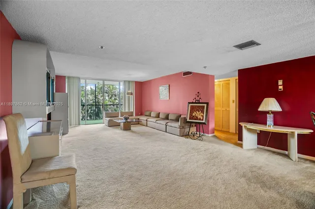 a view of a livingroom with furniture window and outside view