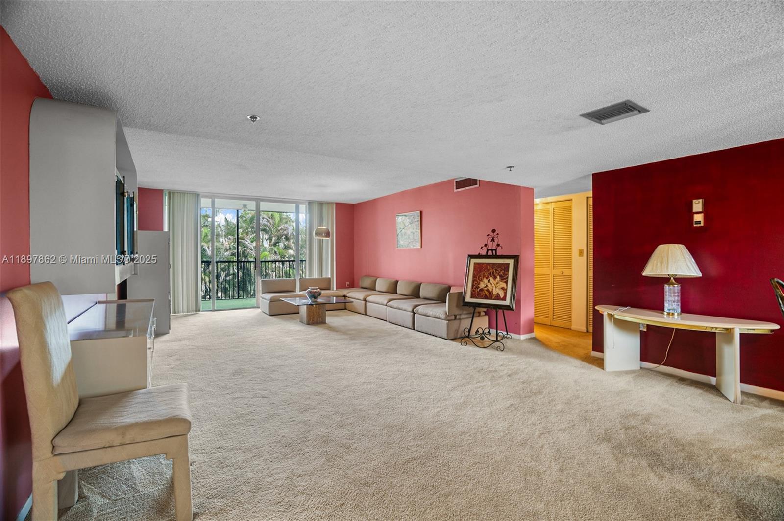 3940 Inverrary Boulevard, Unit 304A Lauderhill, FL 33319 - Photo 5 of 28 a view of a livingroom with furniture window and outside view