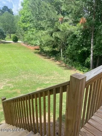 a balcony with an outdoor space